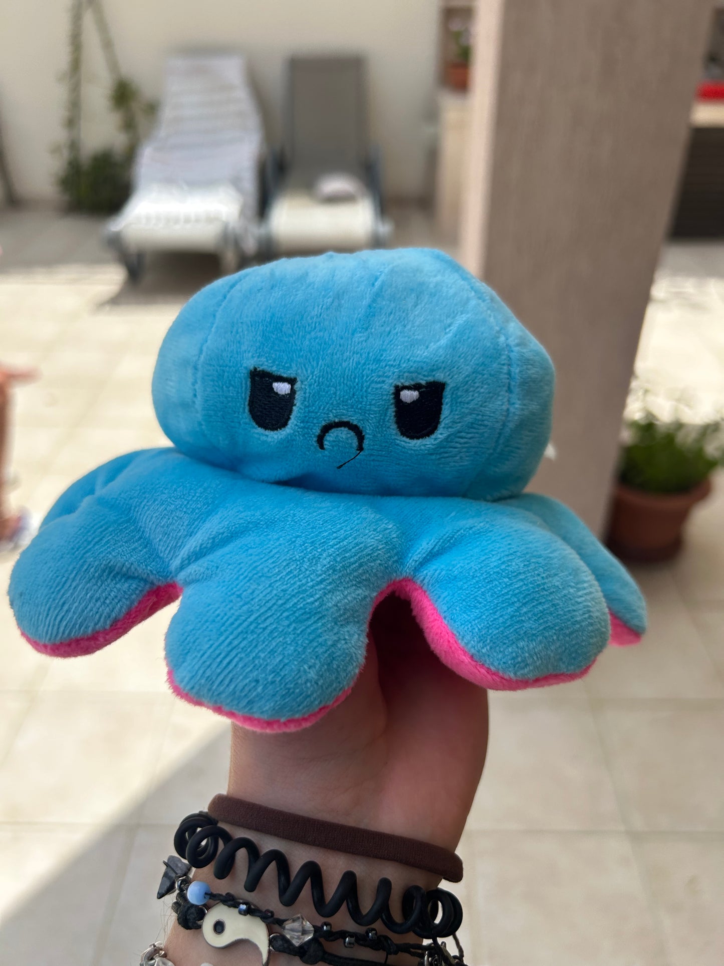 Cuddly toy reversible octopus